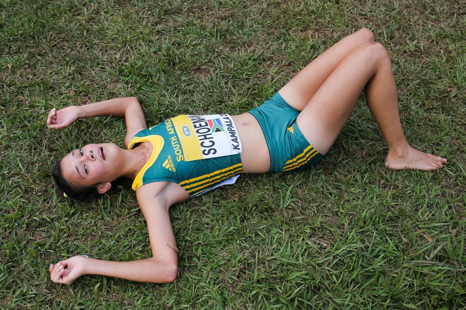  Chery-Lee Schoeman of South Africa lies exhausted at the finish line