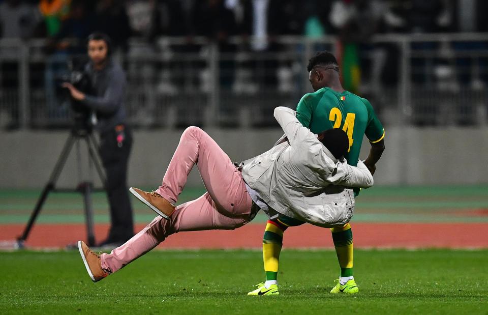  Lamine Gassama was attacked by a pitch invader