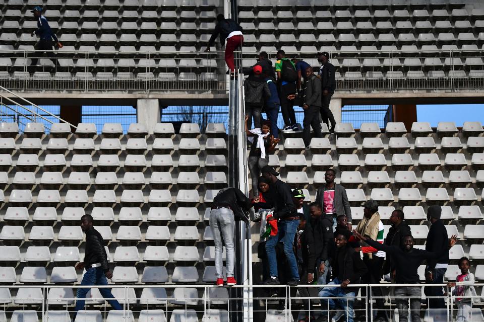  Fans were free to roam around the stadium as they climbed barriers