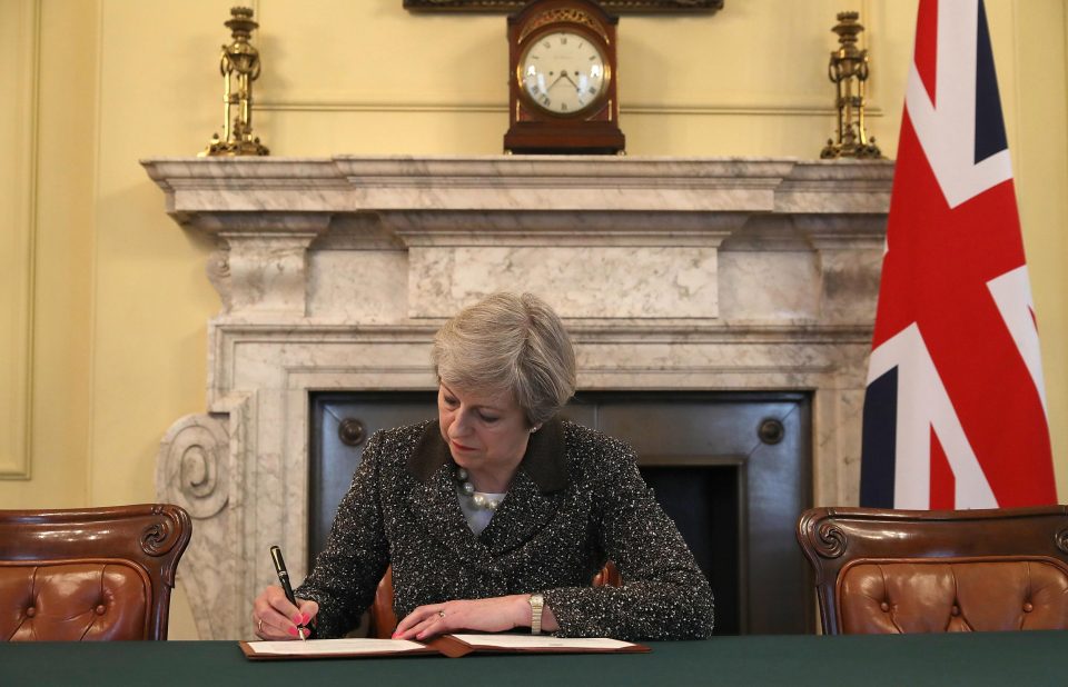  We're out . . . after 46 years in the EU Theresa May signs Article 50