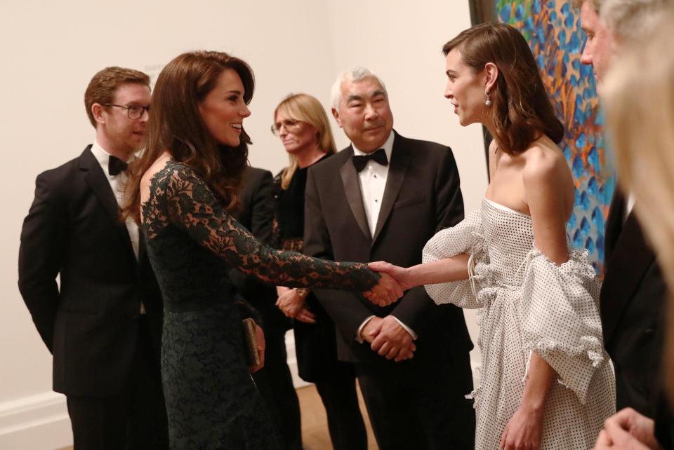  Kate meets Alexa Chung and looks delighted to meet the fashionista