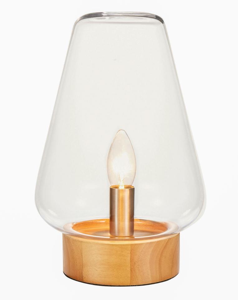  Isla glass table lamp, £35: 'Lighting is important so try low-watt bulbs in warm shades'