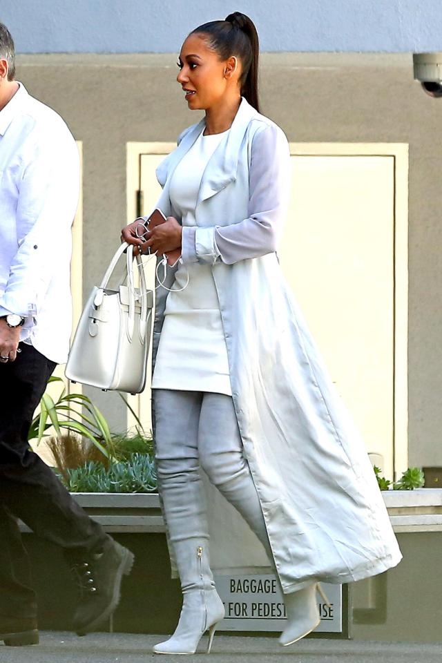  Mel dressed all in white for the occasion as she arrived at the divorce lawyers