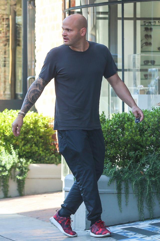  The movie producer wwas seen out and about in Beverly Hills - and was still wearing his wedding ring