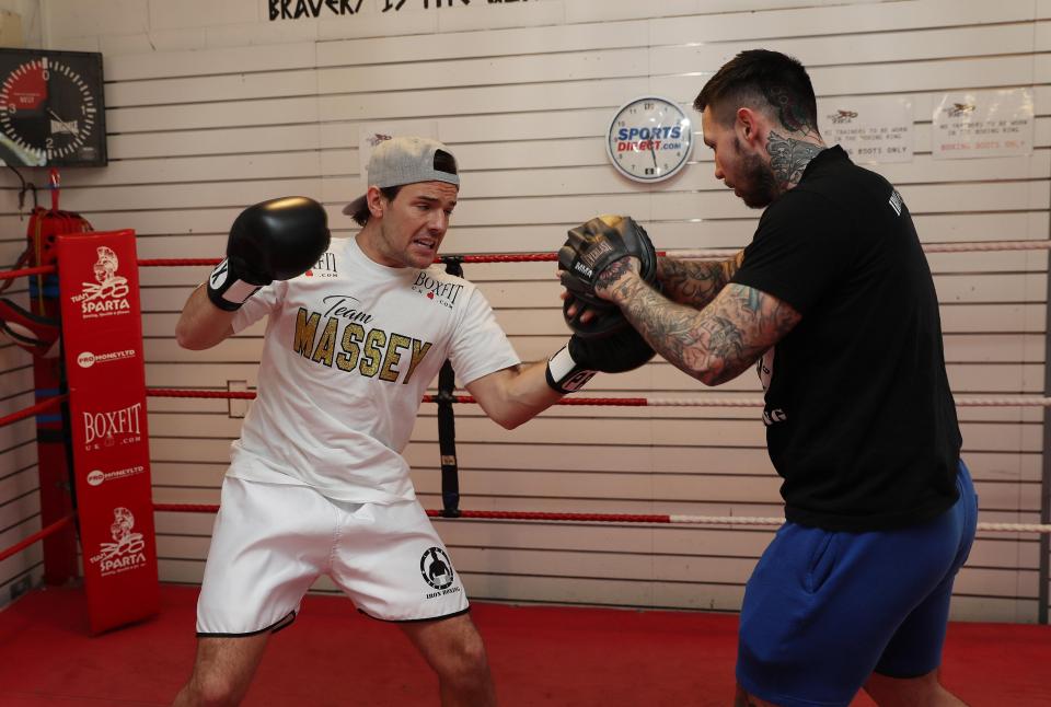  Nathan hit the pads during a workout with his trainer