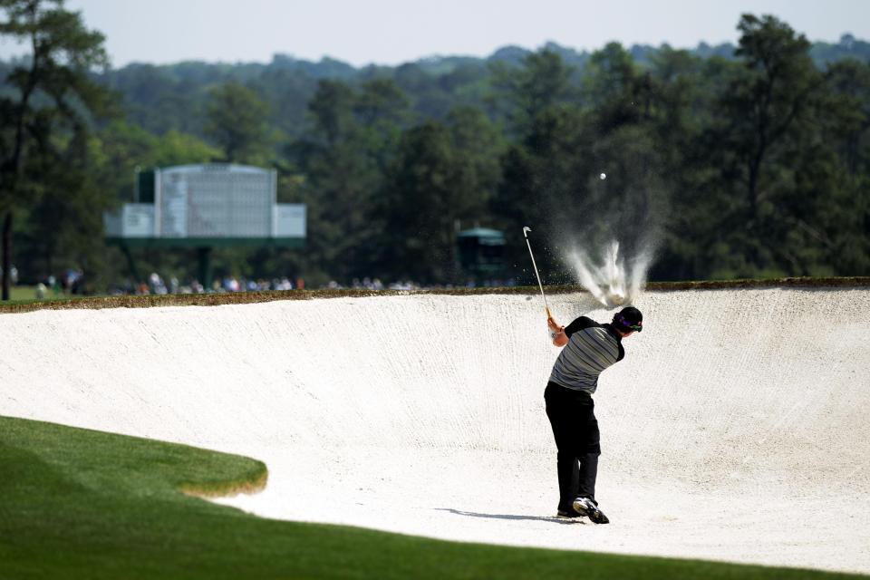  Rory McIlroy hits out of one of Augusta's bunkers