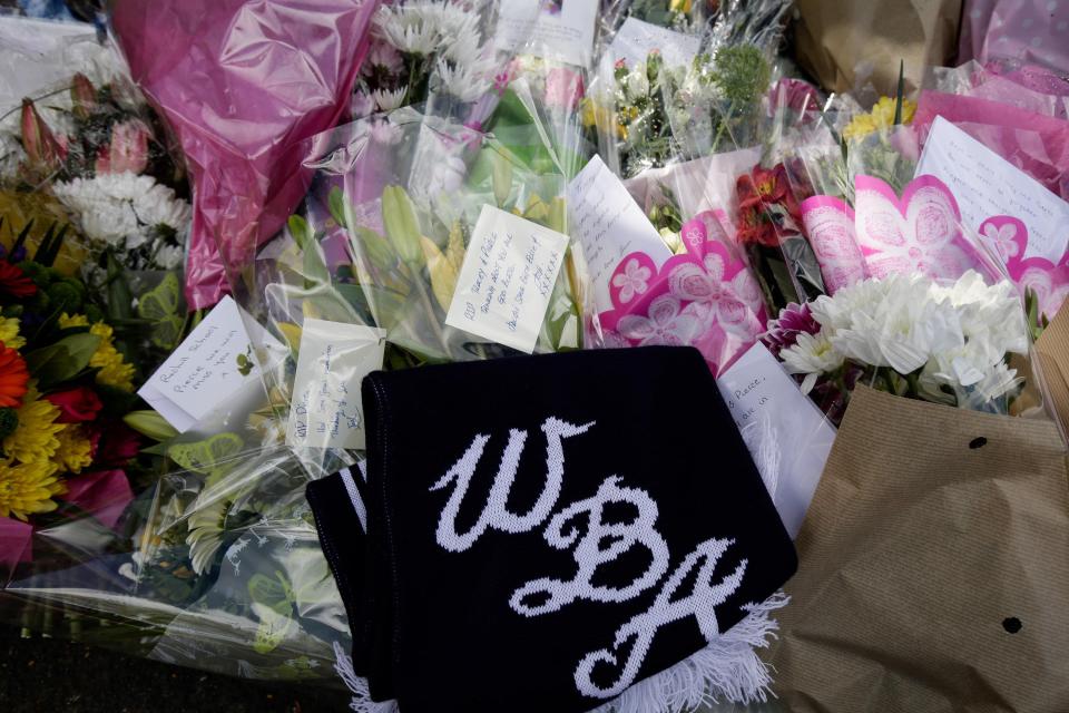  A West Bromwich Albion scarf amongst flowers in Stourbridge, West Midlands