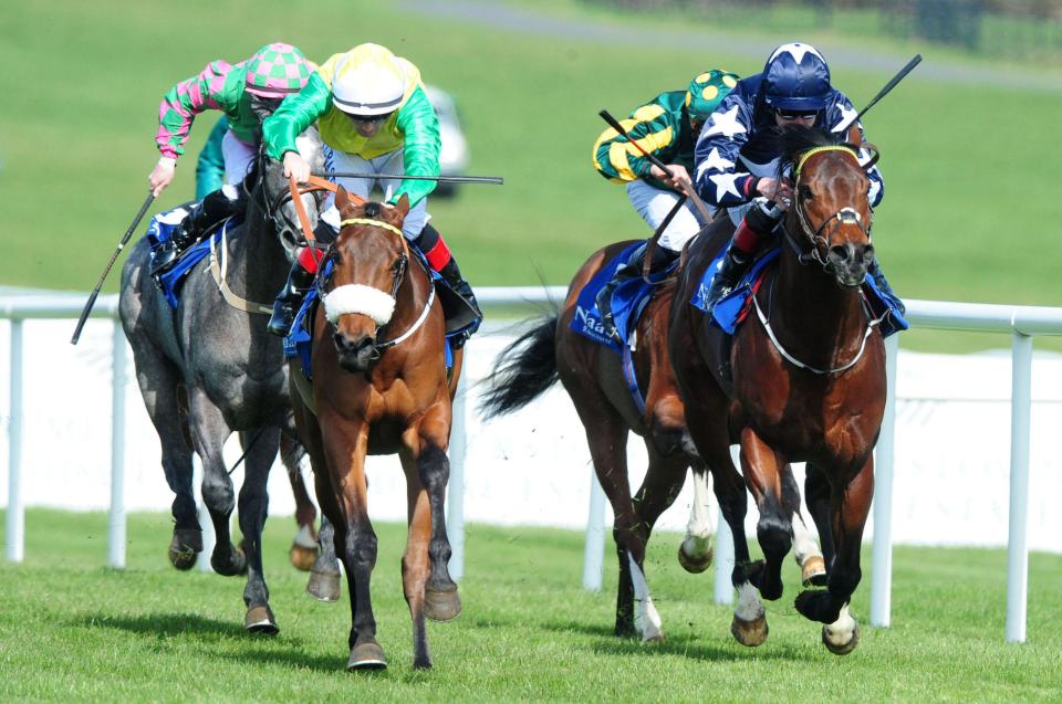  Moonlight Bay (left) wins the first race of the Flat season