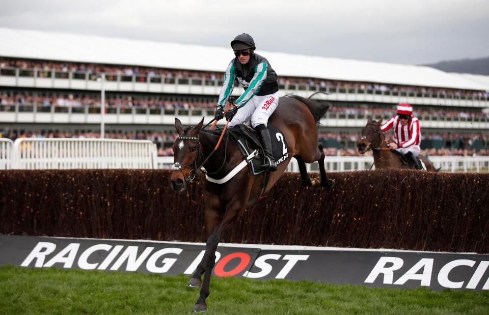  Altior wings a fence on the way to winning the Arkle