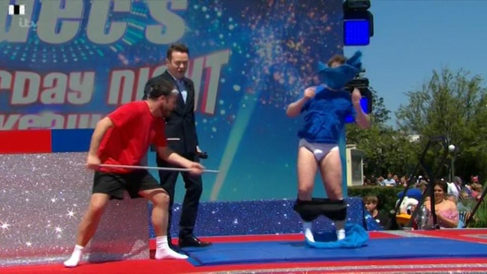  Dec's short were down by his ankles, leaving his underwear on full display