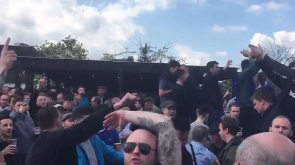  Chelsea fans were snapped outside a pub singing anti-Semitic songs before their FA Cup semi-final