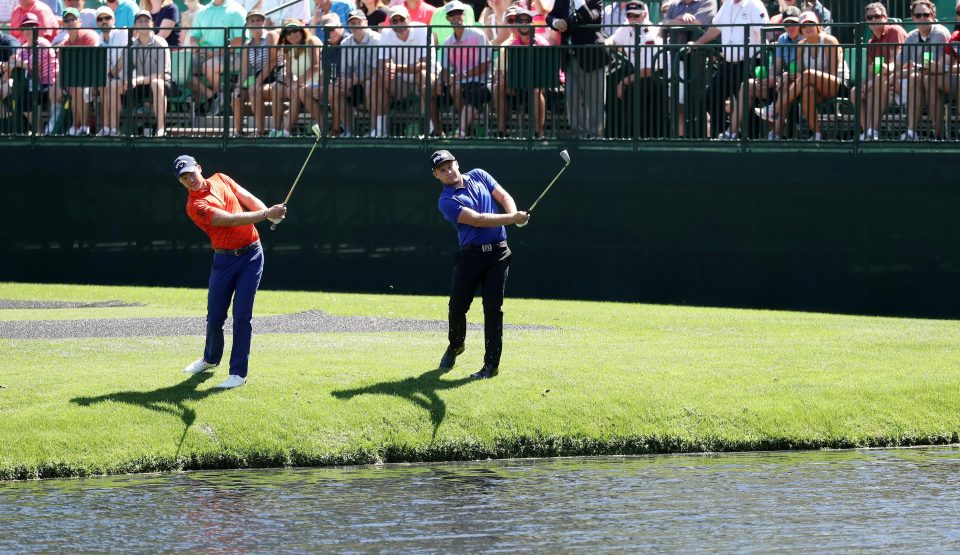  Danny Willett and Tyrrell Hatton hit their shots across the water on Augusta's 16th