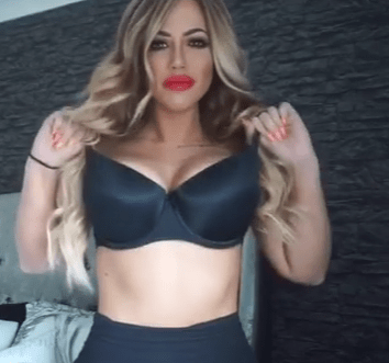  Geordie Shore favourite Holly styled her blonde hair in waves and wore a bright red lipstick for her video