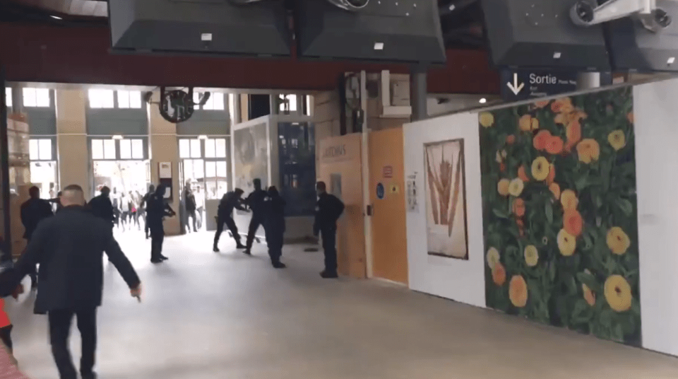  Another video appears to show armed cops surrounding the man during the incident at Paris's Eurostar terminal