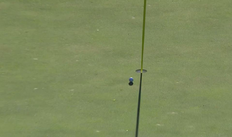  The ball then travelled all the way down the slope and into the hole