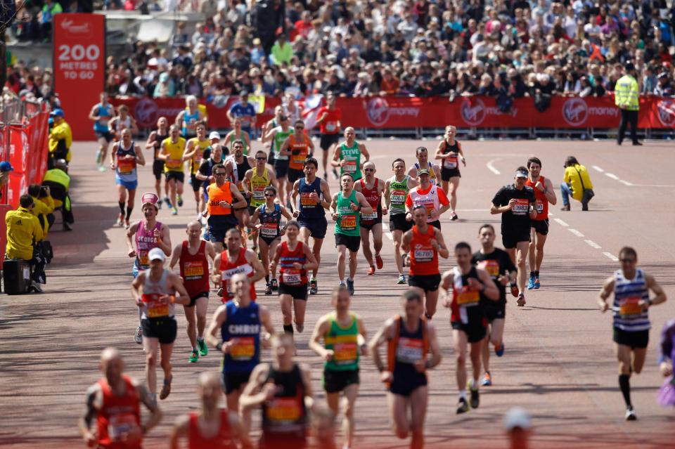  Runners pushing for the finishing line at the London Marathon