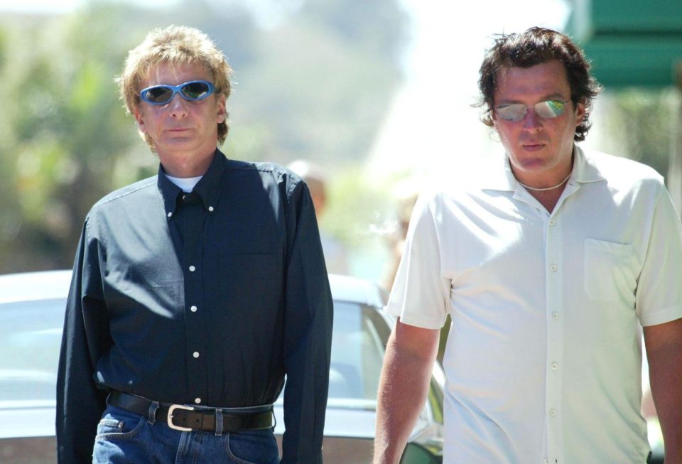  Barry Manilow and now-husband Garry Kief are seen walking side-by-side in 2003