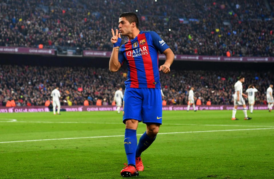 Luis Suarez celebrates scoring goal against Real Madrid earlier in season