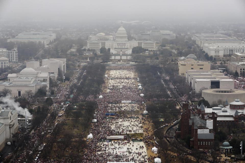  Crowds gather in Washington DC to watch Trump's inauguration which led to the many vicious spats with the 'fake news' press was over the size of the crowd at the event