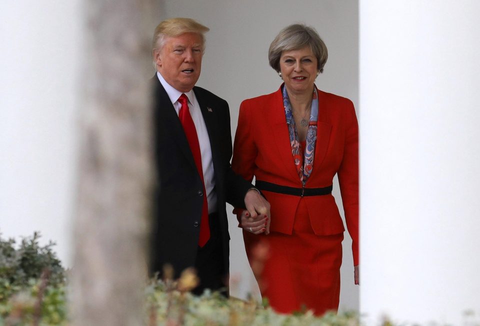  Donald Trump has enjoyed a close relationship with the PM over his first 100 days in office - here he holds hands apparently because he has a fear of stairs