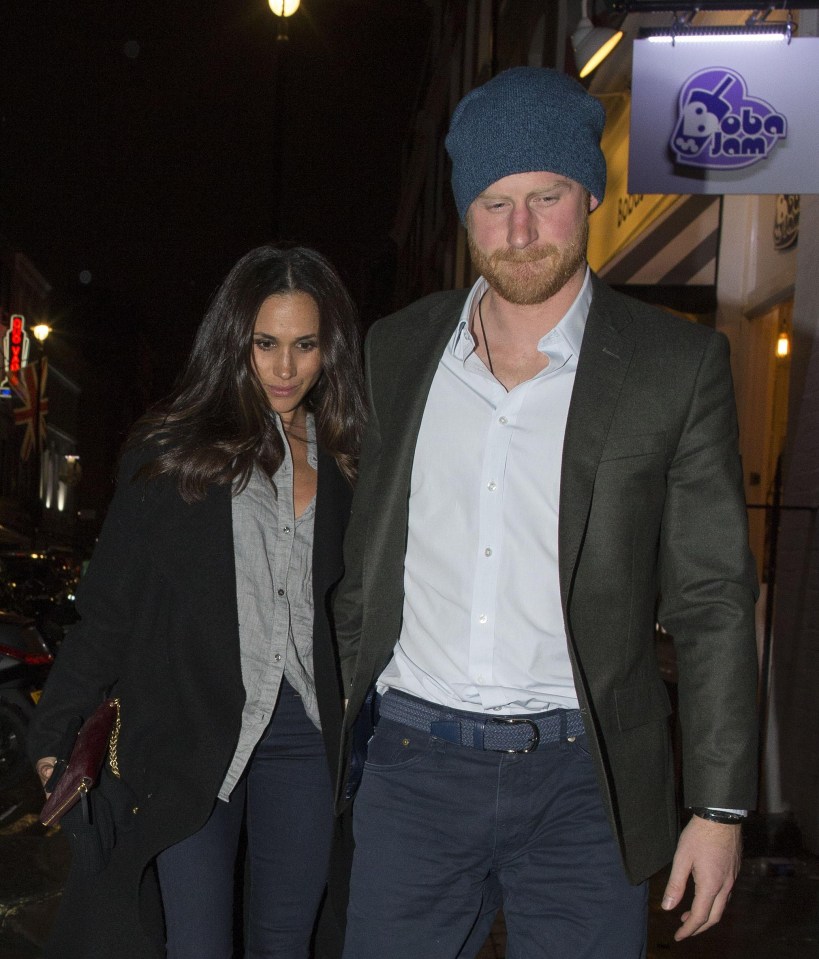 Prince Harry and Meghan Markle hold hands while out in London