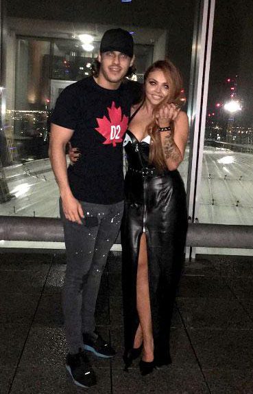  Chris Clark and Jesy Nelson posing while they were a couple last year