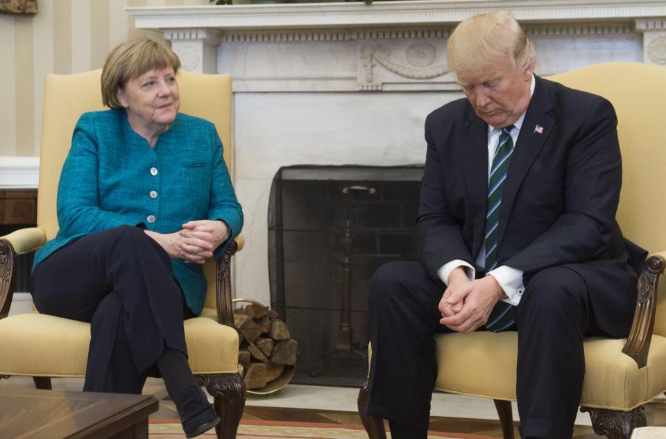 US President Donald J. Trump, right, and German Chancellor Angela Merkel who fears the new administration could frustrate the status quo that benefits her nation's exporters