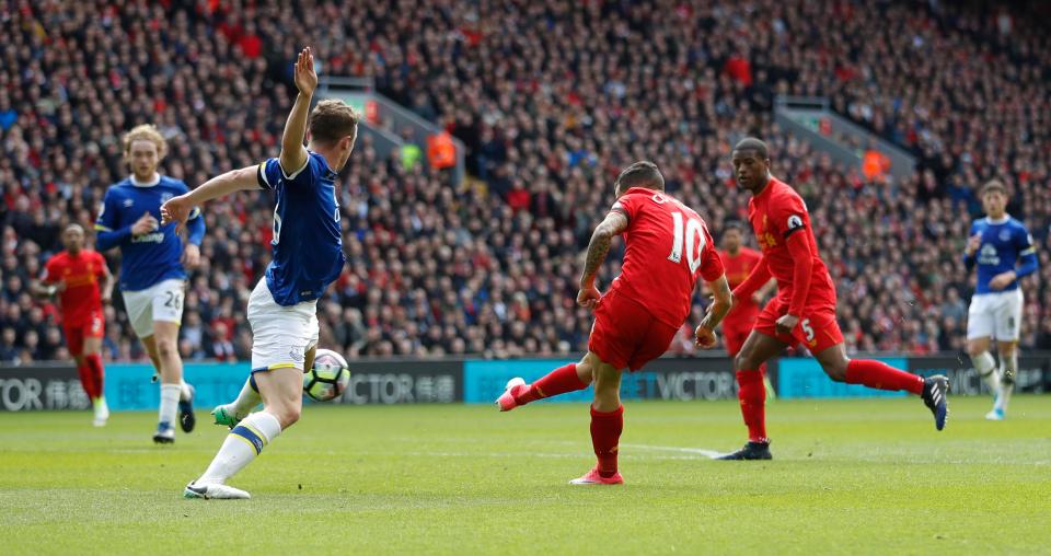  Brazil star Coutinho curls home for 2-1