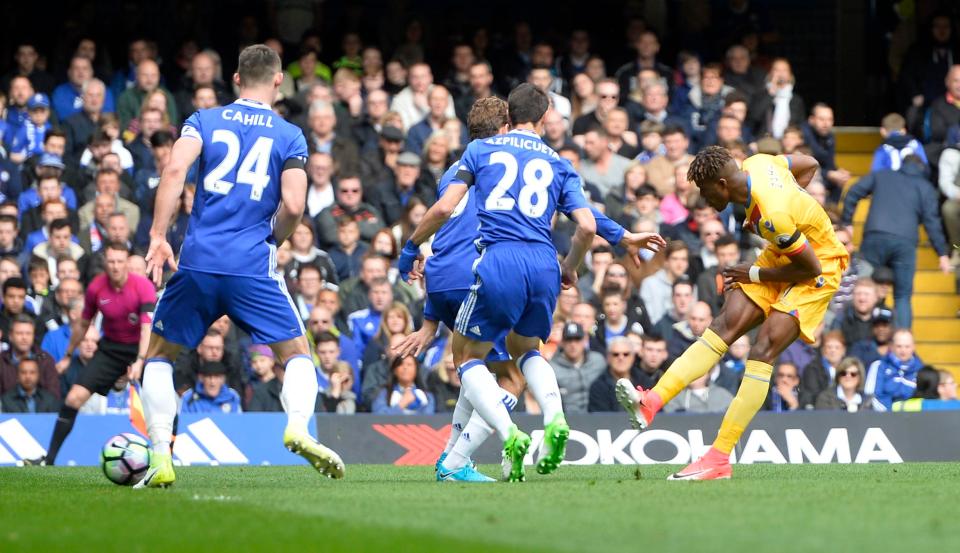  Wilfried Zaha drills his low shot past the Chelsea defence for the equaliser