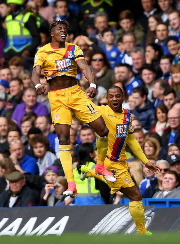  Zaha and Jason puncheon celebrate his equalising goal against Chelsea