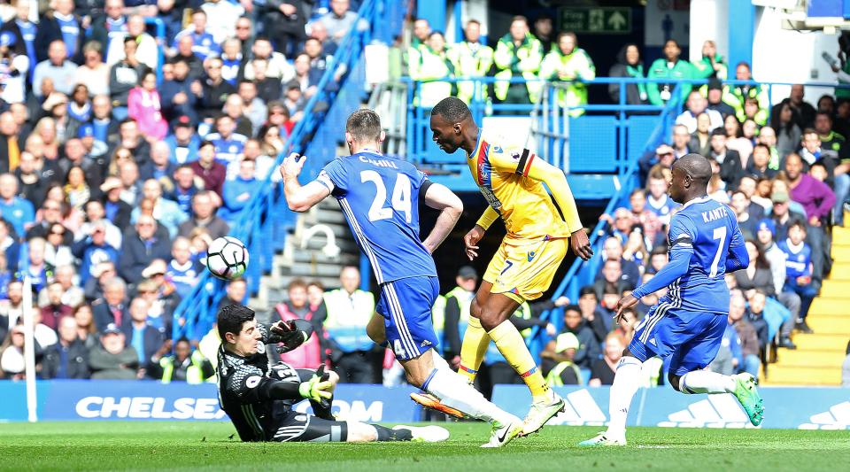  Christian Benteke fools Thibaut Courtois as he puts Palace ahead at Stamford Bridge