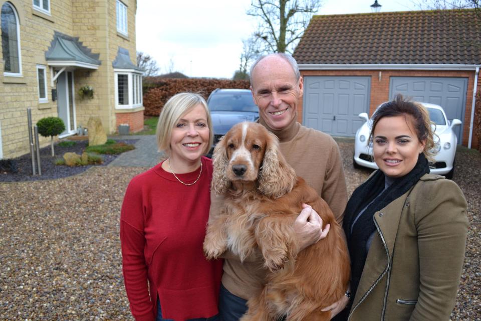  The Bentleys with their dog, outside their Lincoln house