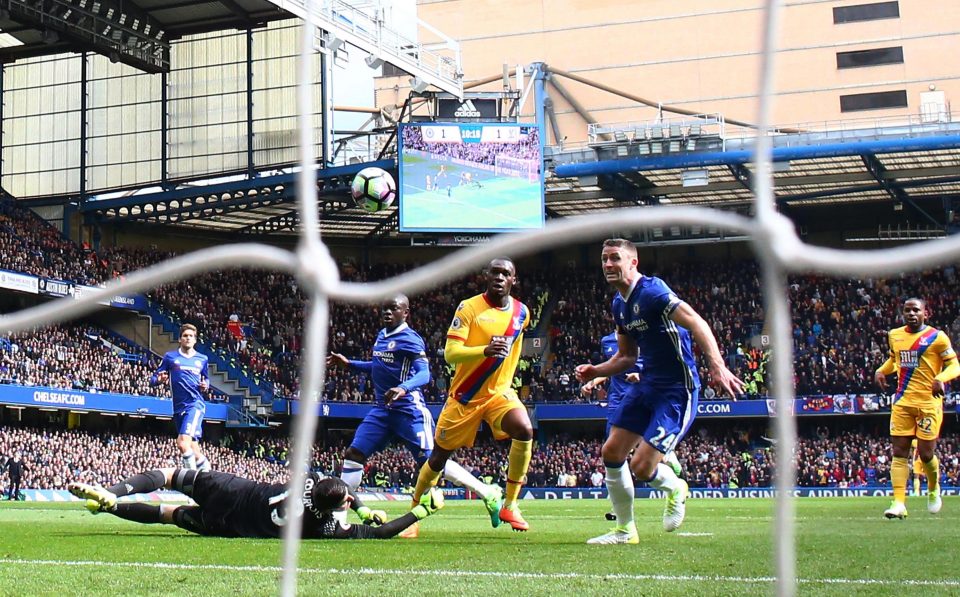  Christian Benteke chips past Thibaut Courtois to stun Chelsea