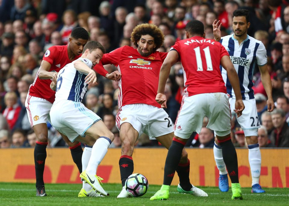  Marcus Rashford, left, was largely snuffed out by a packed Baggies defence