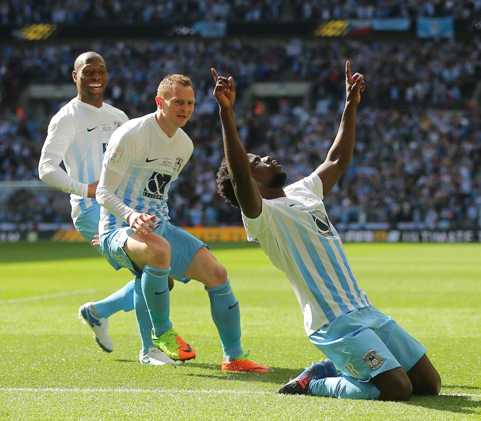  Gael Bigirimana celebrates after opening the scoring against Michael Appleton's side