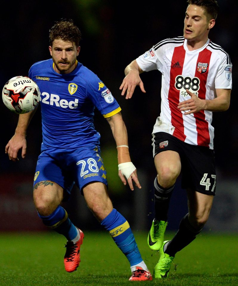  Brentford hero Sergi Canos (right) battles it out with Gaetano Berardi