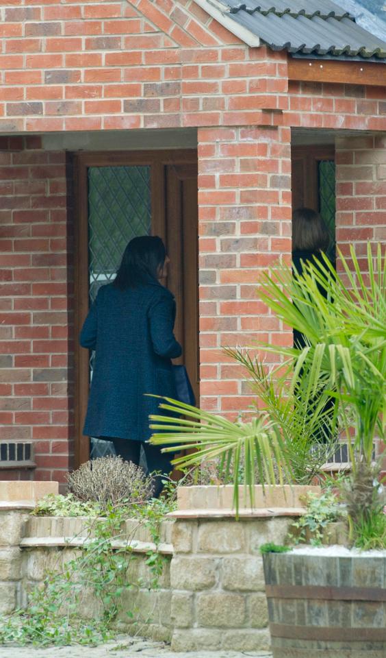  Two women, believed to be female plain clothes police officers, visit the home of Leicester City footballer Ahmed Musa in Countesthorpe