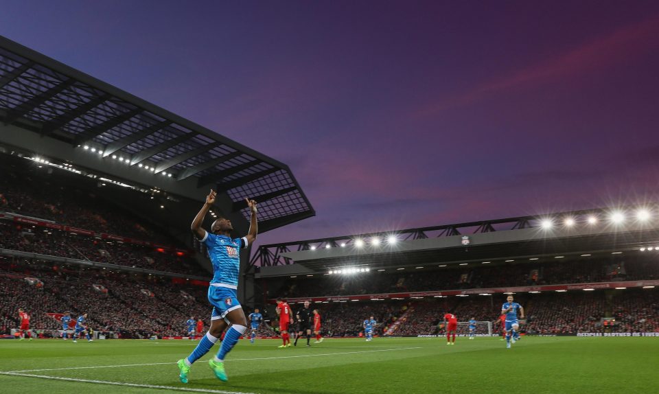  Benik Afobe celebrates his early goal for Bournemouth at Anfield