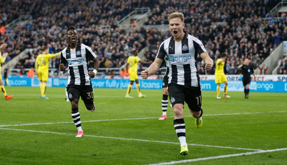  Matt Ritchie runs off to celebrate after scoring a penalty... or at least he thought