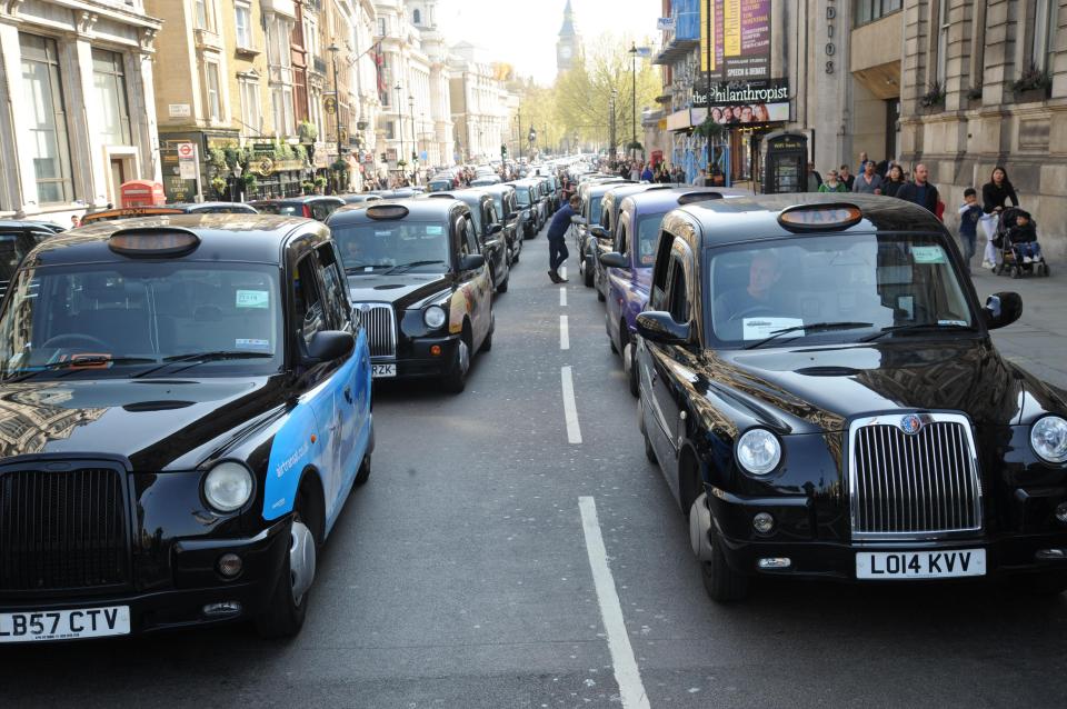  Black cab drivers blockade Whitehall in a protest against Uber