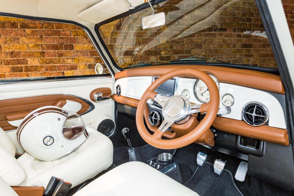  Step inside and the Mini launches itself into the 21st century