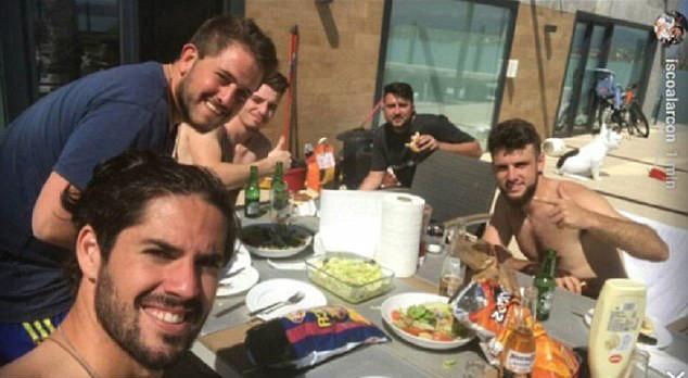 Isco accidentally took the photo with a bag of Barcelona-branded crisps in the background