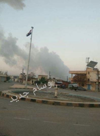  An image purportedly from the town of Al-Sha'irat showing smoke rising from the airbase where the attack took place