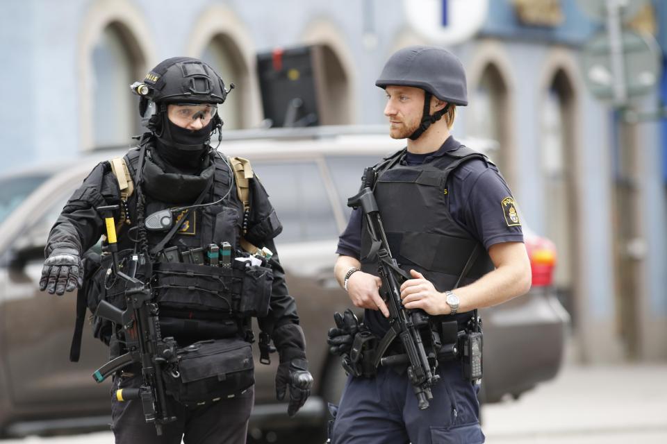  Armed police are on the scene in Stockholm where the city centre remains on lockdown