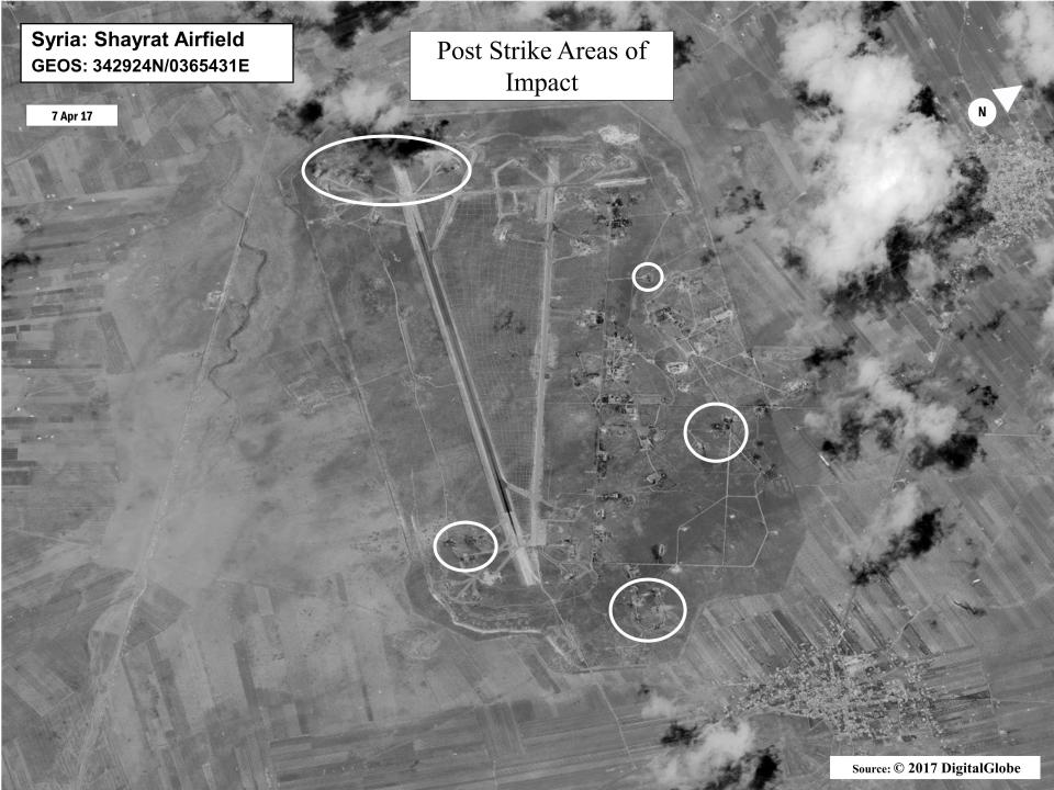  This handout from the Office of the Secretary of DefenCe shows a battlefield damage assessment image of Shayrat Airfield