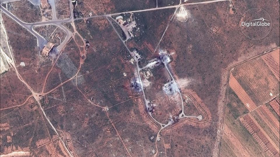  This satellite image provided by DigitalGlobe shows an image captured on April 7 of destroyed building on the southeast side of the Shayrat air base in Syria