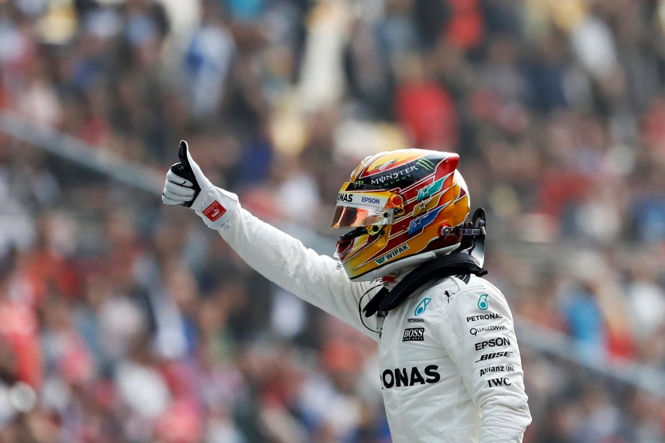 The Brit waves to his fans in the stands in Shanghai