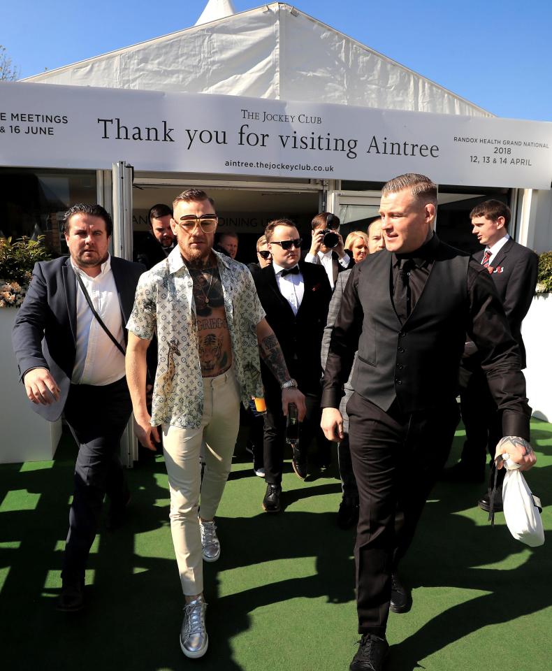  Conor McGregor joined crowds at the faces, bearing his chest and wearing sunglasses