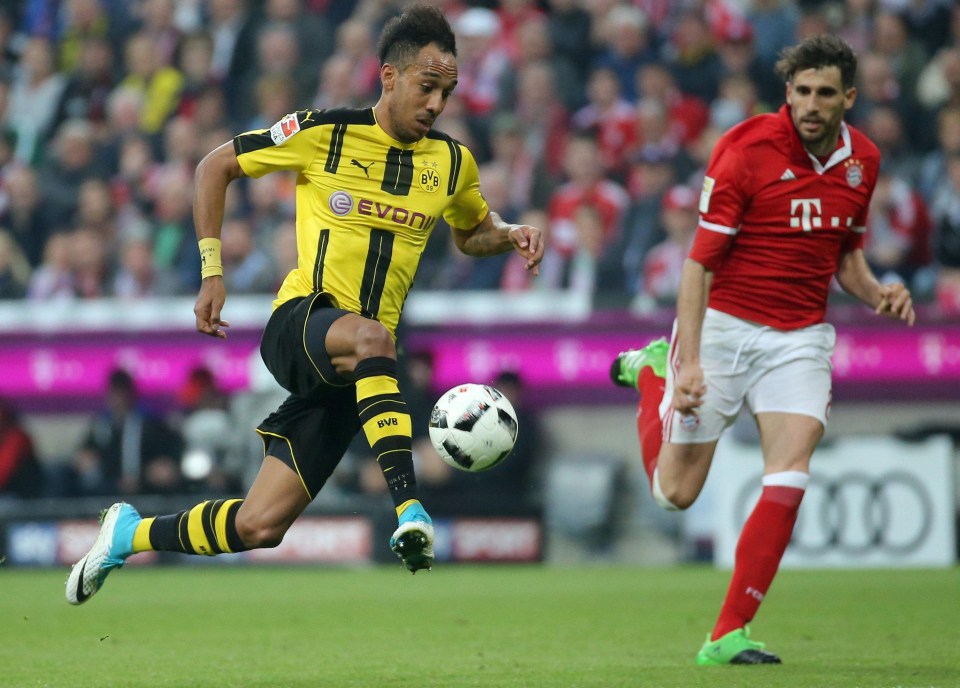 Dortmiund frontman Pierre-Emerick Aubameyang takes on Bayern star Javi Martinez 