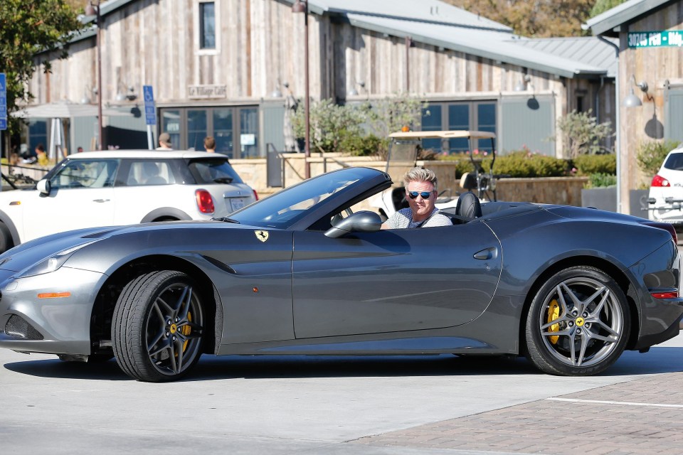 Gordon Ramsay in one of his NINE Ferraris